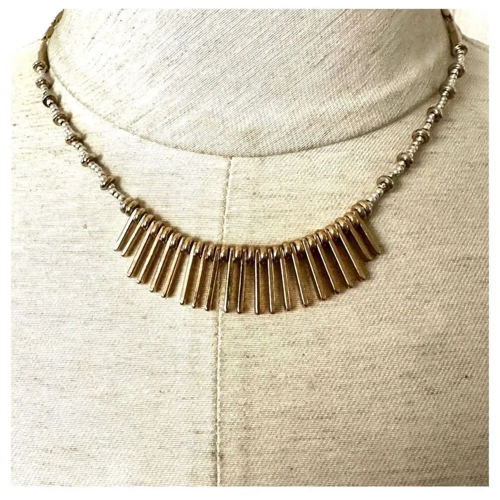 Gold and silver tone metal bar necklace